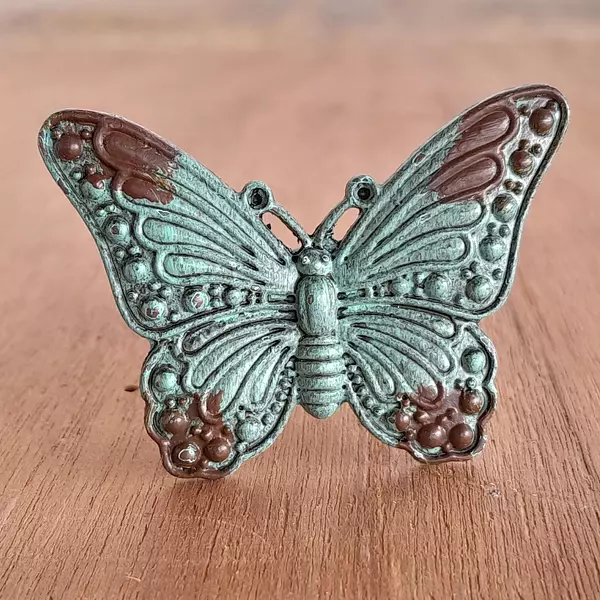 Perilla Metálica Con Forma Mariposa