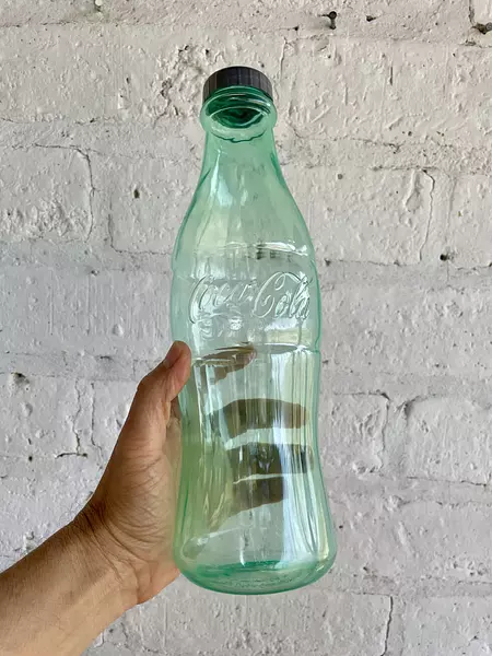 Botella Monedero Coca Cola Verde Translúcido