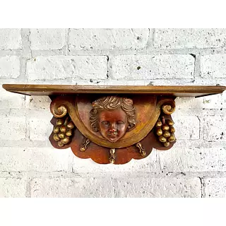 Repisa Cara De Ángel Y Racimos De Uvas