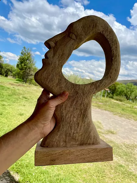 Esculturas Caras De Mujer Y Hombre En Madera